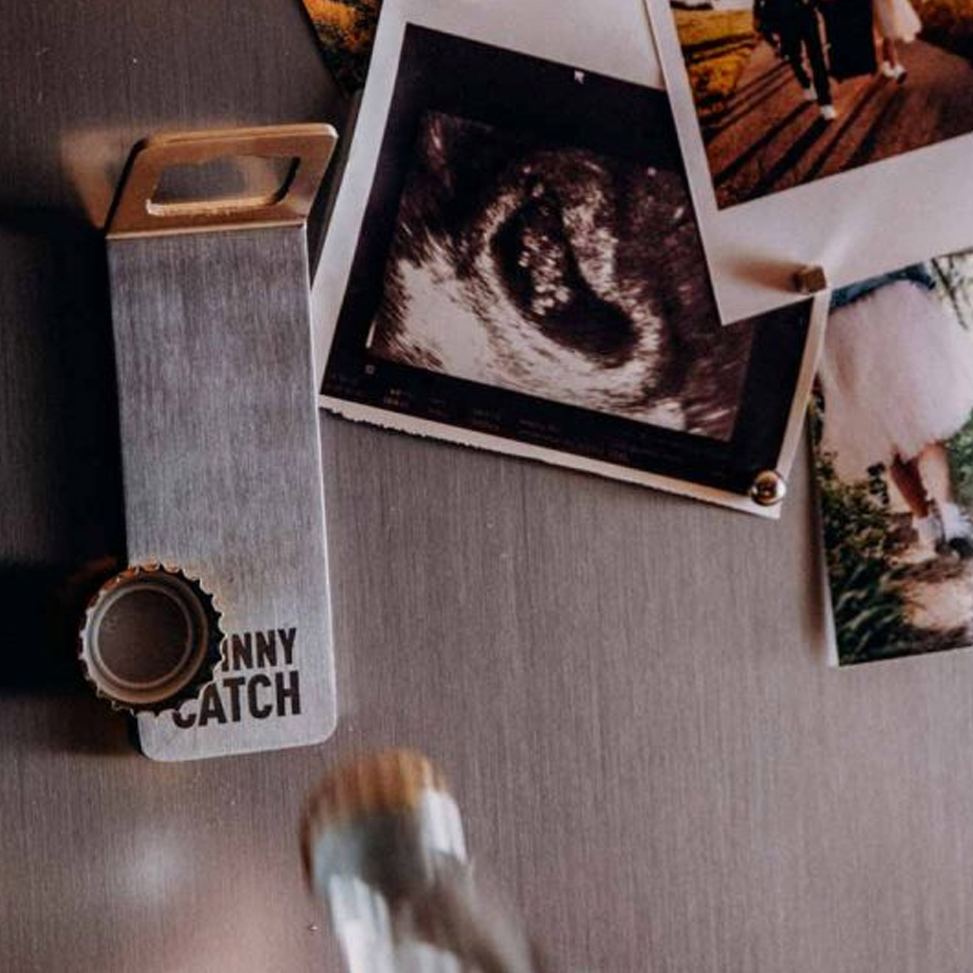 Magnet Bottle Opener Silver, polaroid photos, sonogram/ultrasound image, photo clips, metal tool, calculator/mini tool