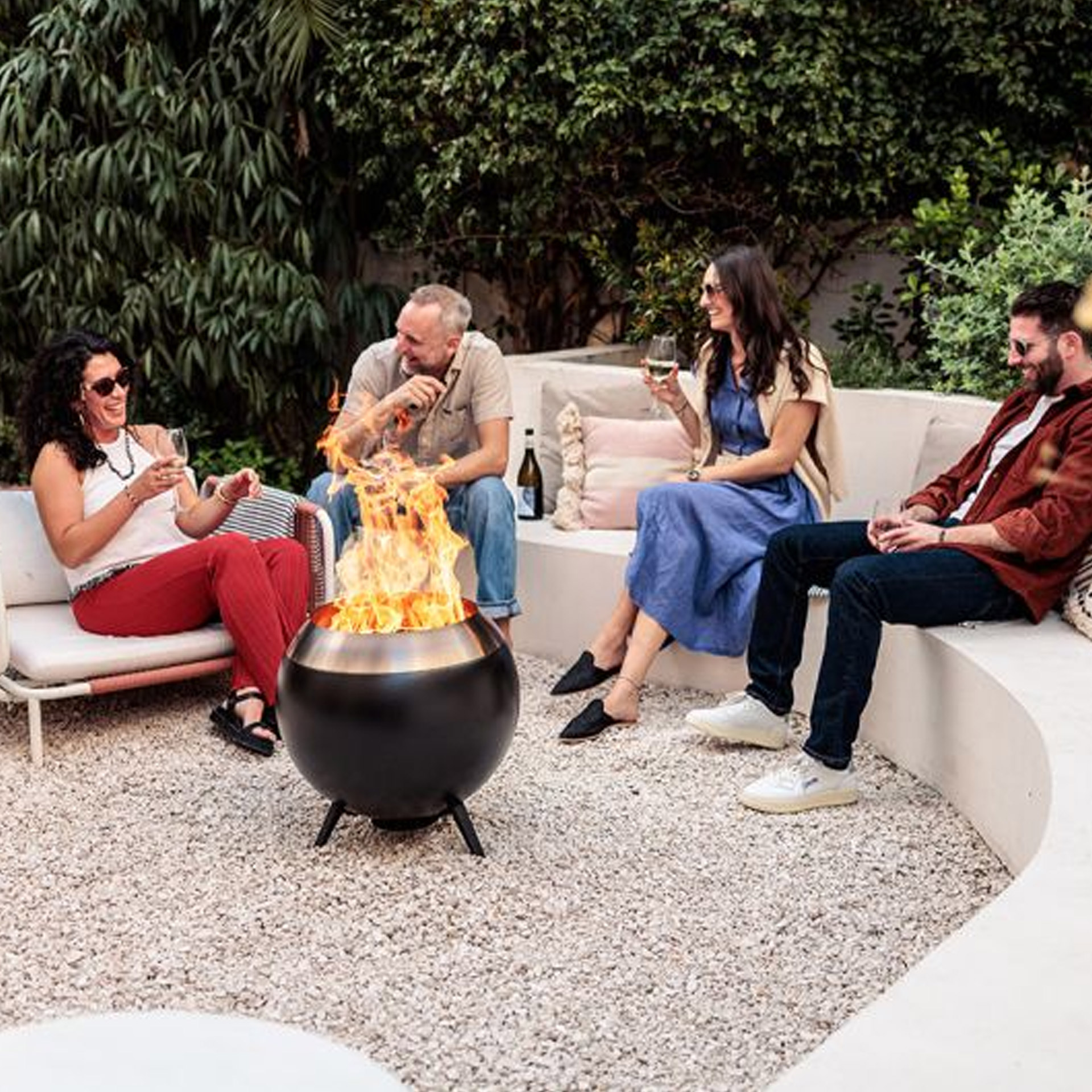Fire basket 55 with heigh stand silver, outdoor seating, fire pit, lounge set, gravel ground, glass of wine